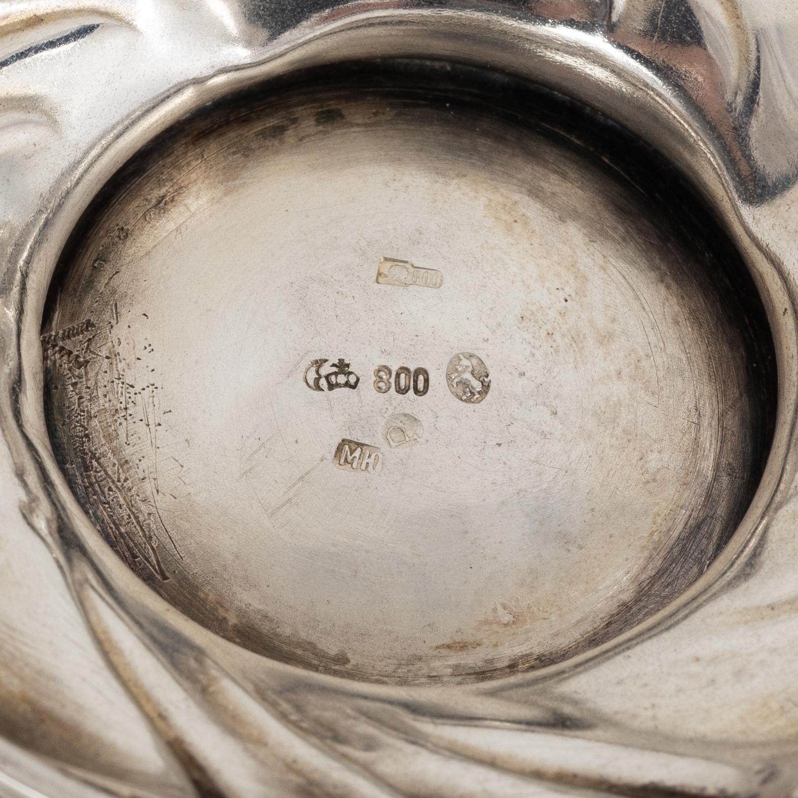 A Rococo style silver sugarbox and two creamers, including Lars Larsson ...