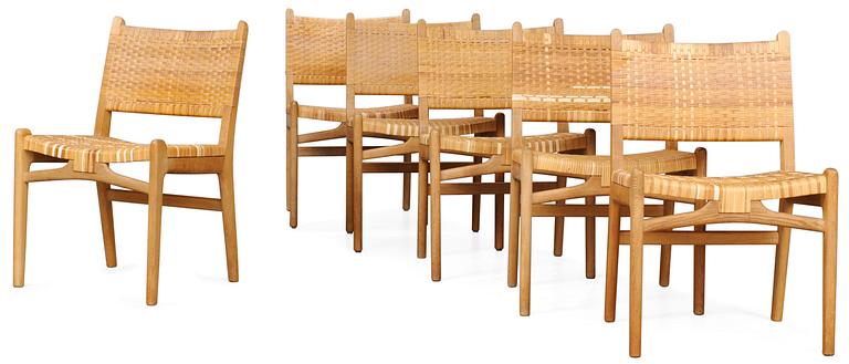 A set of six Hans J Wegner oak and rattan chairs, Carl Hansen, Odense, Denmark.