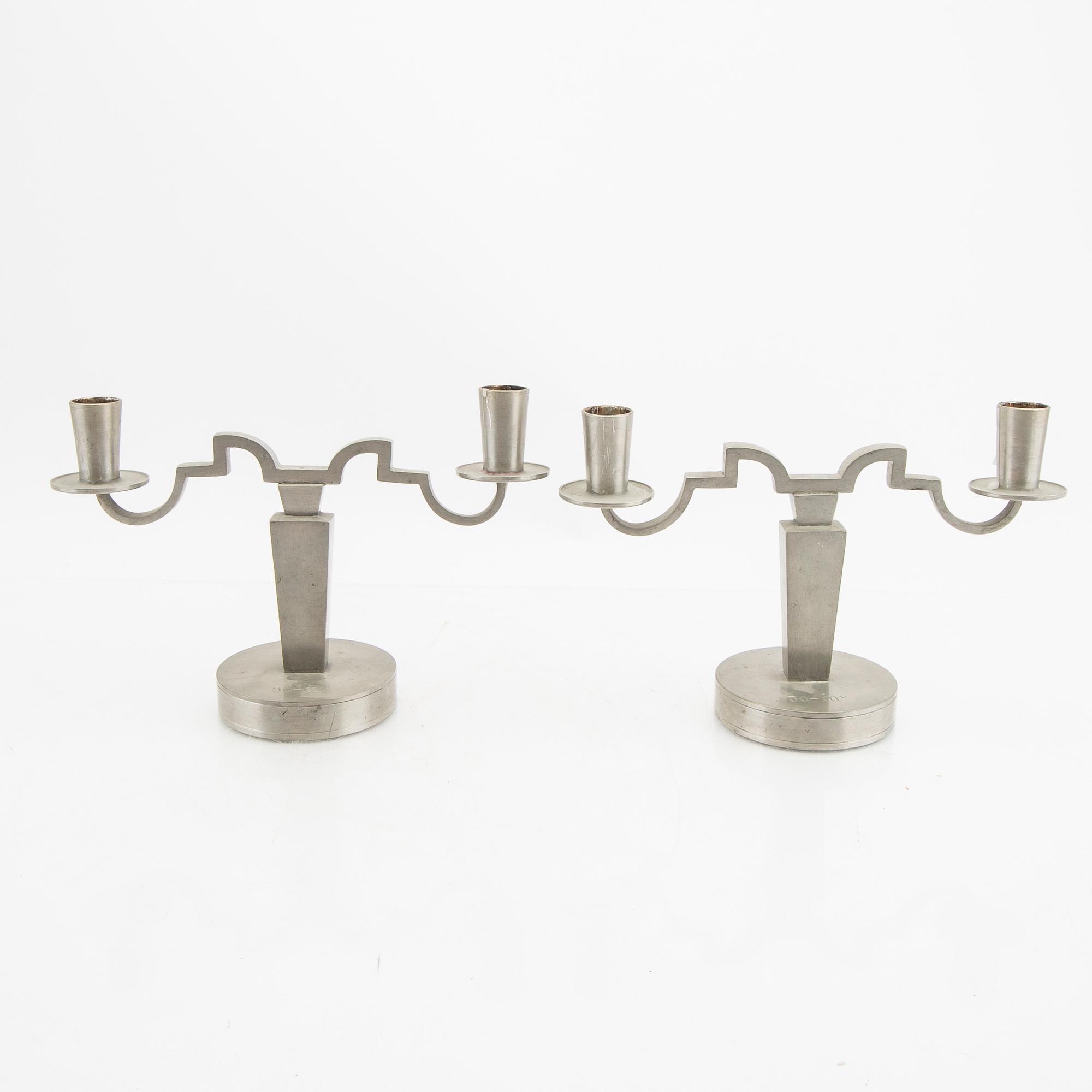 A pair of Firma Svenskt Tenn pewter candelabras 1933.