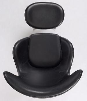 Arne Jacobsen, an "Egg" chair with ottoman, Fritz Hansen, Denmark, 2001.