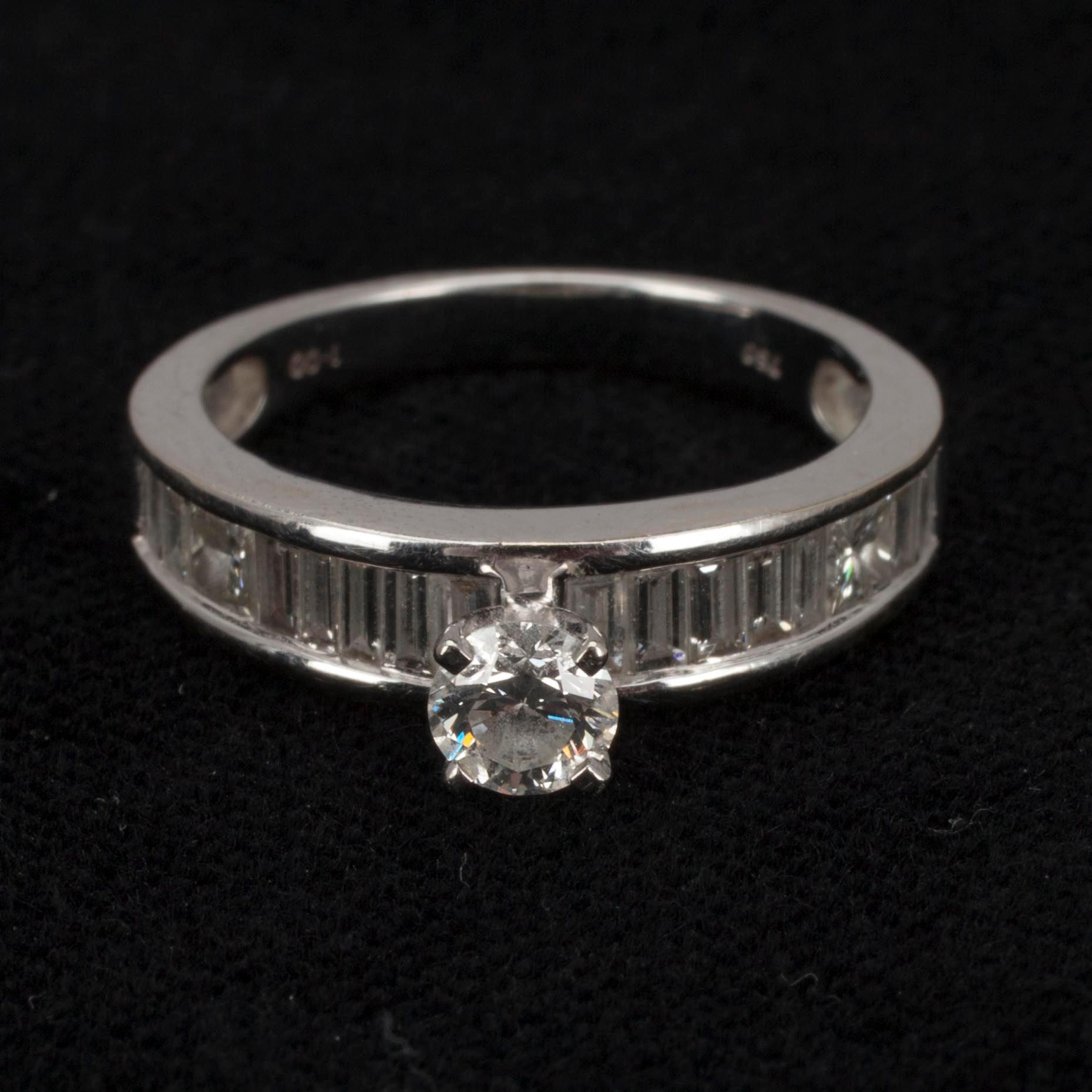 RING, vitguld 18K och diamanter tot. 1 ct. Vikt ca 4 g.