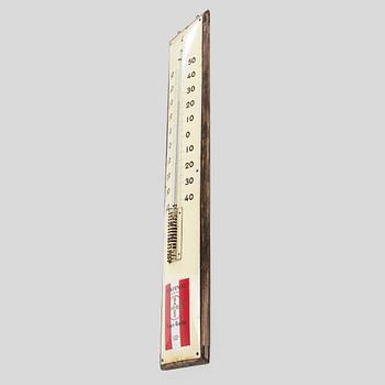 a mid-20th century outdoor thermometer.