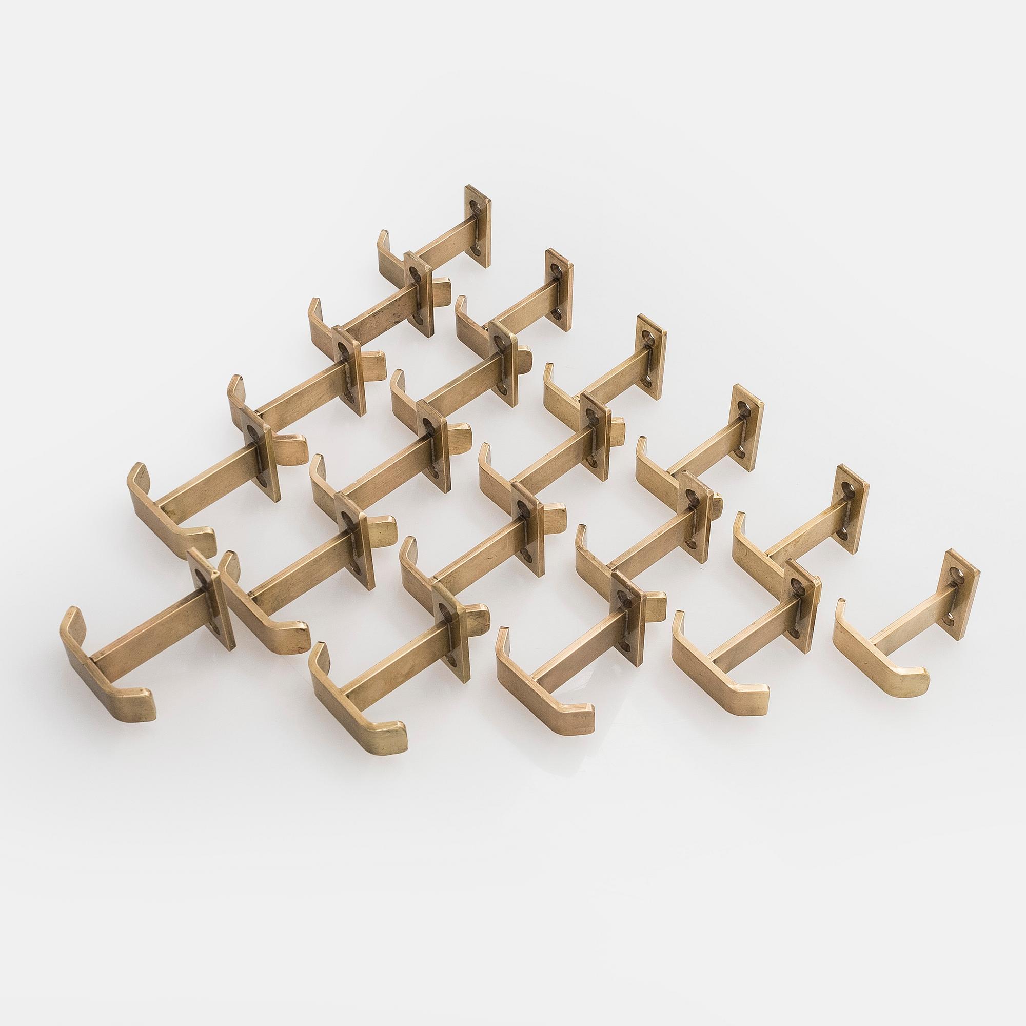 A set of 19 coat hooks, 1960s/70s.