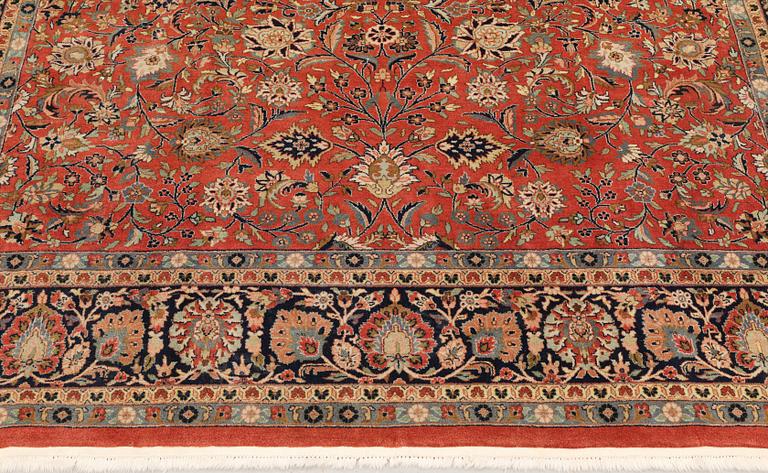 An oriental rug, c. 295 x 205 cm.