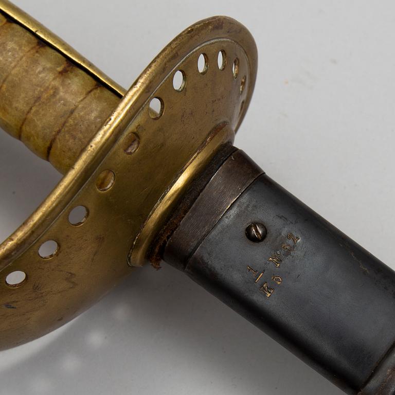 A Swedish sabre 1893 pattern with scabbard.