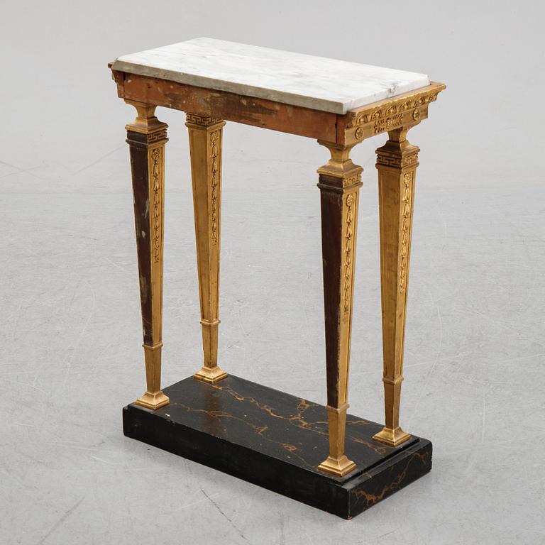 An early 19th Century console table.