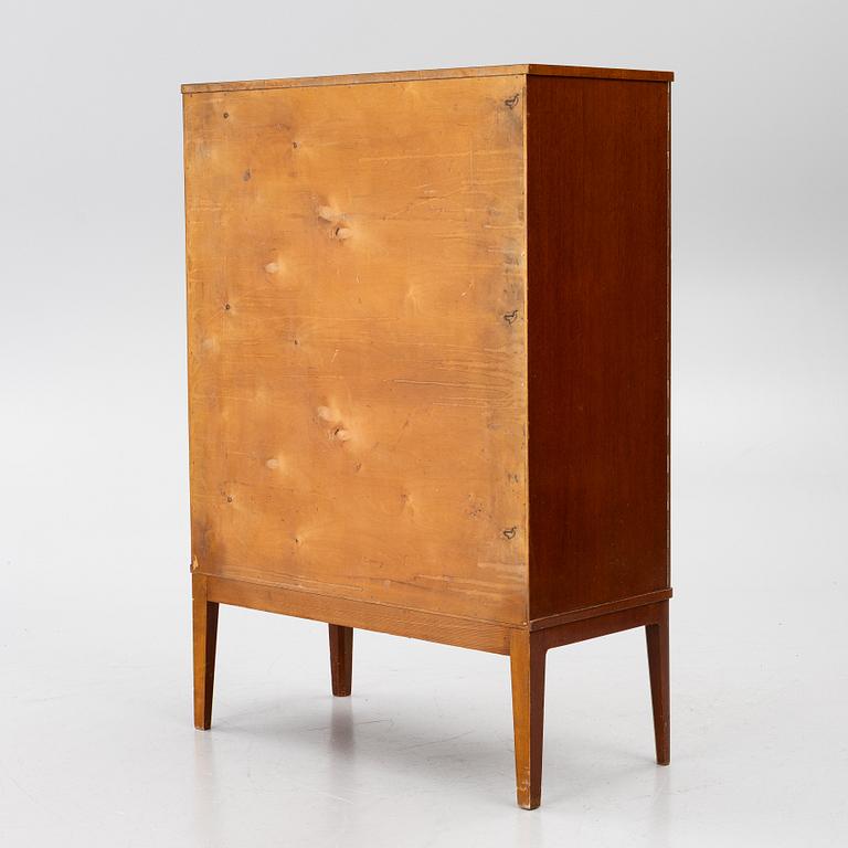 A Swedish Modern cabinet, 1940s.