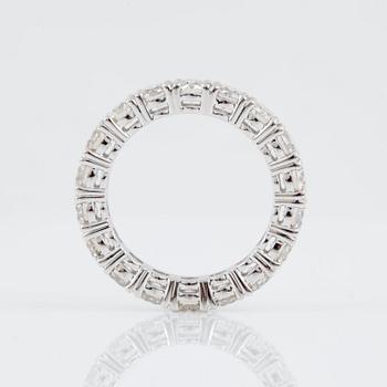 An eternity diamond ring, total carat weight 3.93 cts according to engraving. Quality circa I-K/SI.