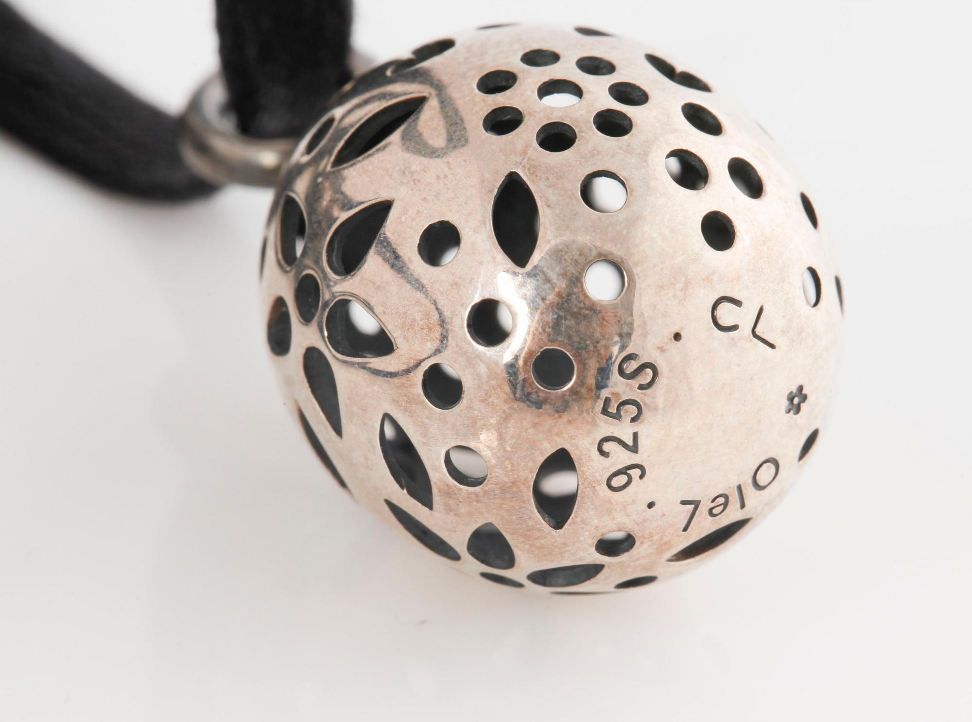 A pendant, "Blond" by Charlotte Lynggaard.