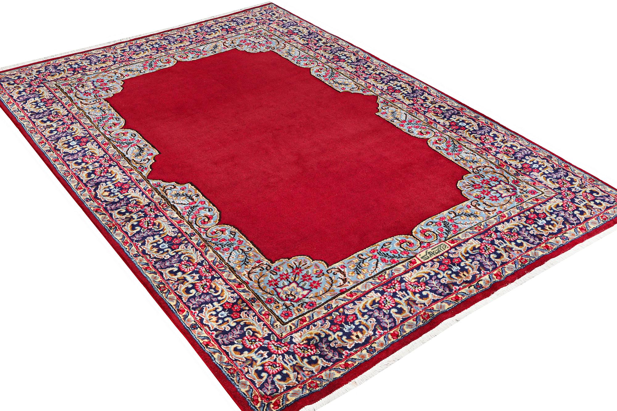 A Kerman carpet, signed Mirani, c. 290 x 208 cm.