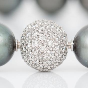 A cultured Tahiti pearl and brilliant-cut diamond necklace.