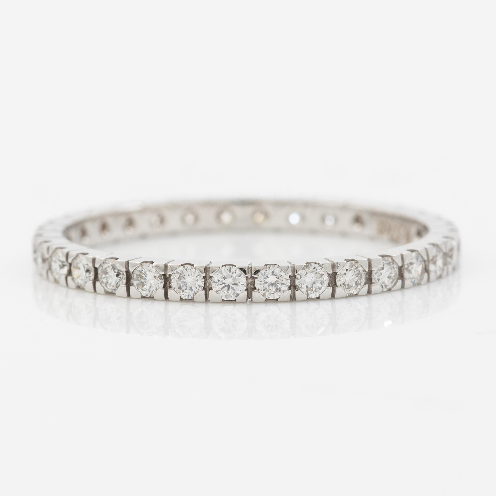 Ring, full eternity, 18K white gold with brilliant-cut diamonds.