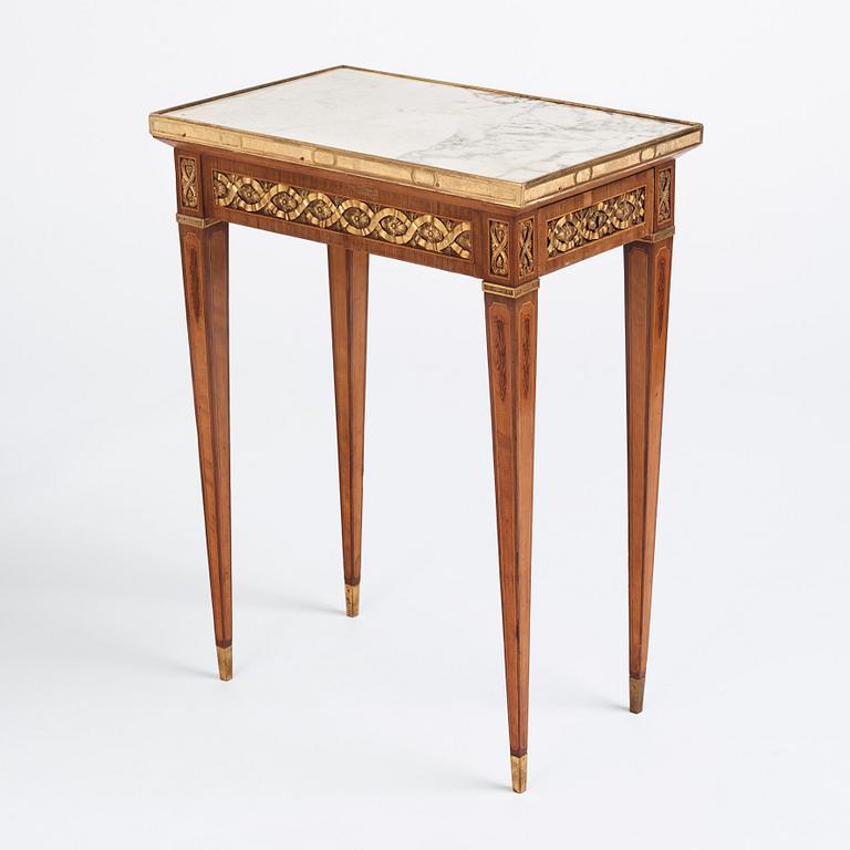 A Gustavian marquetry, ormolu-mounted, and marble table by G. Iwersson (master in Stockholm 1778-1813), signed 1781.