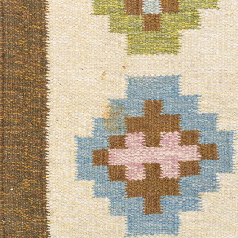 A flat weave carpet, signed EE, ca 242 x 170 cm.