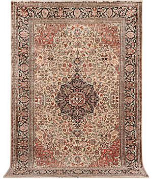 A carpet, silk Kashmir, c. 279 x 180 cm.