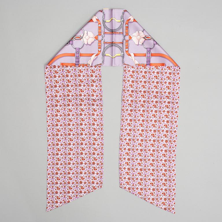 Hermès, a Maxi Twilly, 'Grand Manège' silk scarf.