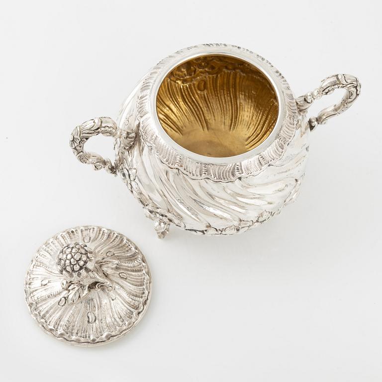 A Spanish Silver Rococo-Style Coffee Pot, Creamer and Sugar Bowl, first half of the 20th Century.