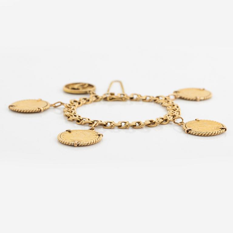 Armband guld bismarcklänk med berlocker med guldmynt.