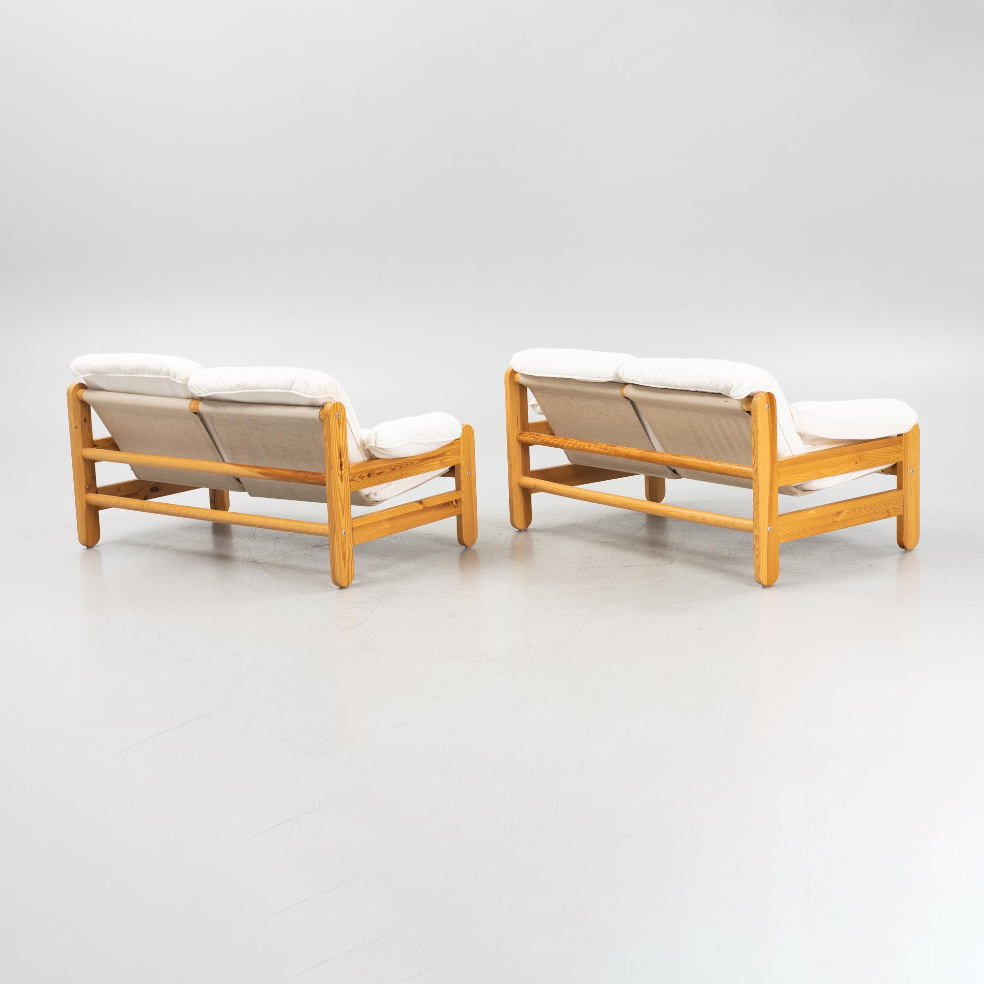 A pair of pinewood sofas from IKEA, second part of the 20th Century.
