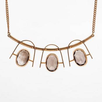 Eero Rislakki, halssmycke, fasettslipade rökkvartser, 14K guld. Westerback, 1960.