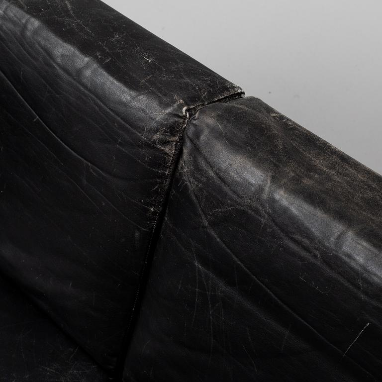 A 1960's leather covered sofa.