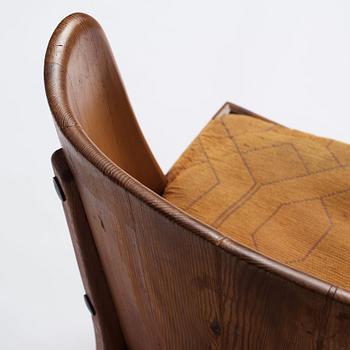 Axel Einar Hjorth, a pair of stained pine 'Lovö' chairs, Nordiska Kompaniet, Sweden 1930s.
