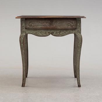 A french rococo-style table, 19th century.