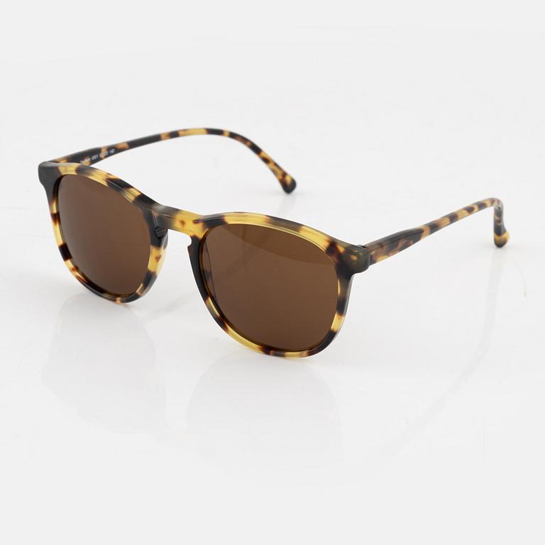 Illesteva, a pair of tortoise sunglasses.