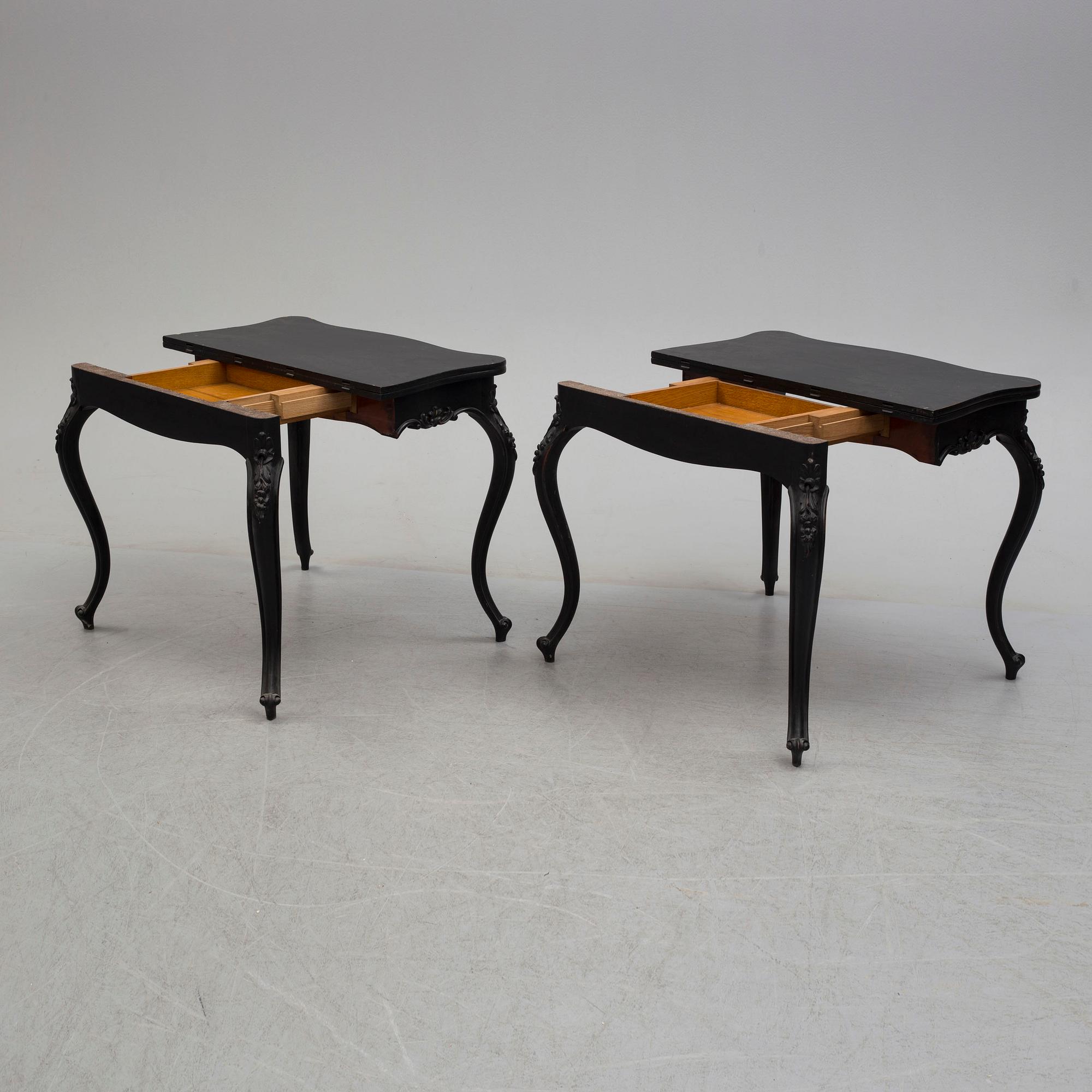 A pair of end of the 19th century new rococo style painted card tables.
