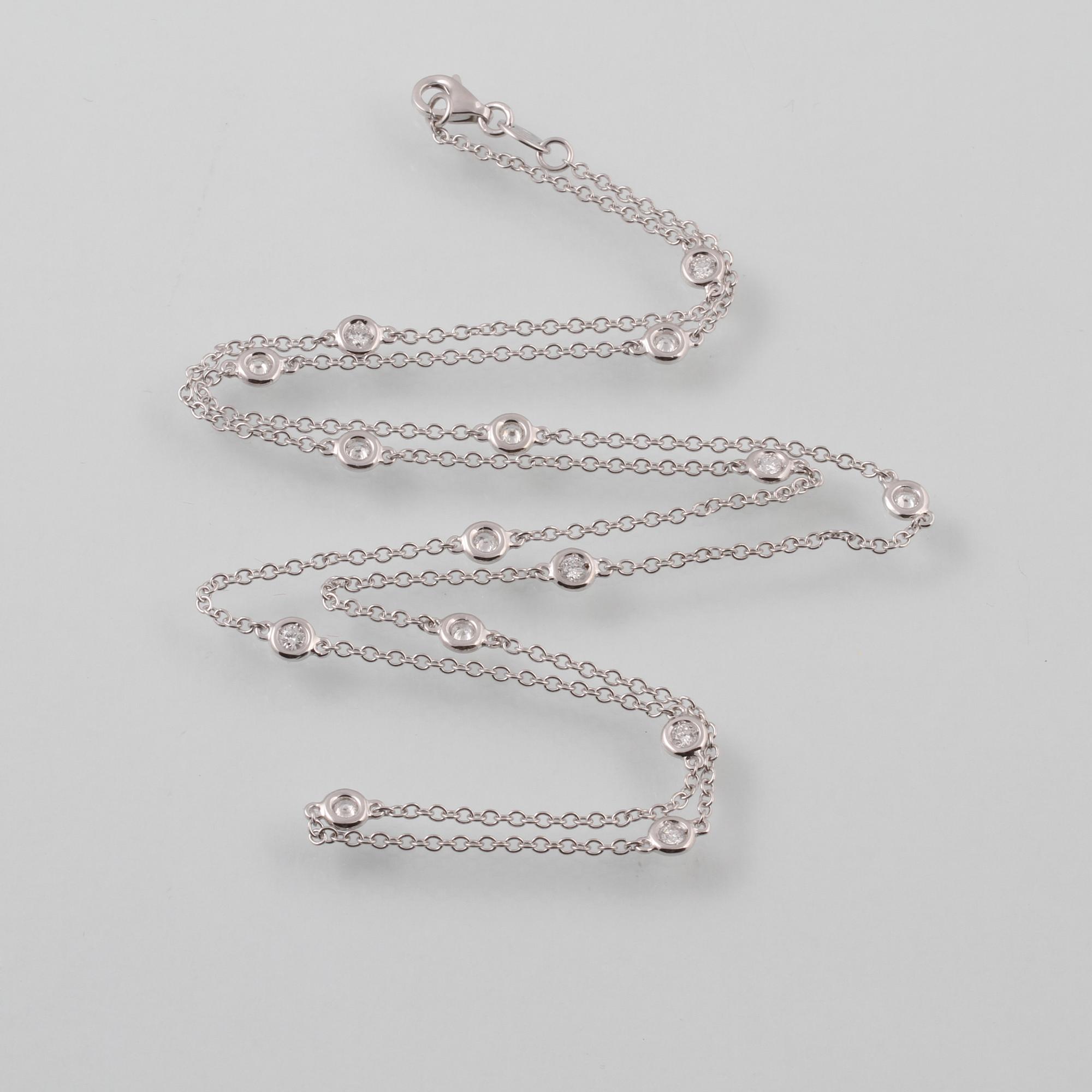 COLLIER, 18K vitguld med 15 briljantslipade diamanter ca 0.70 ct, Milano, Italien. Vikt 5,8 gram.