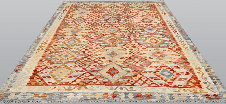 A Kilim carpet, ca 290 x 215 cm.