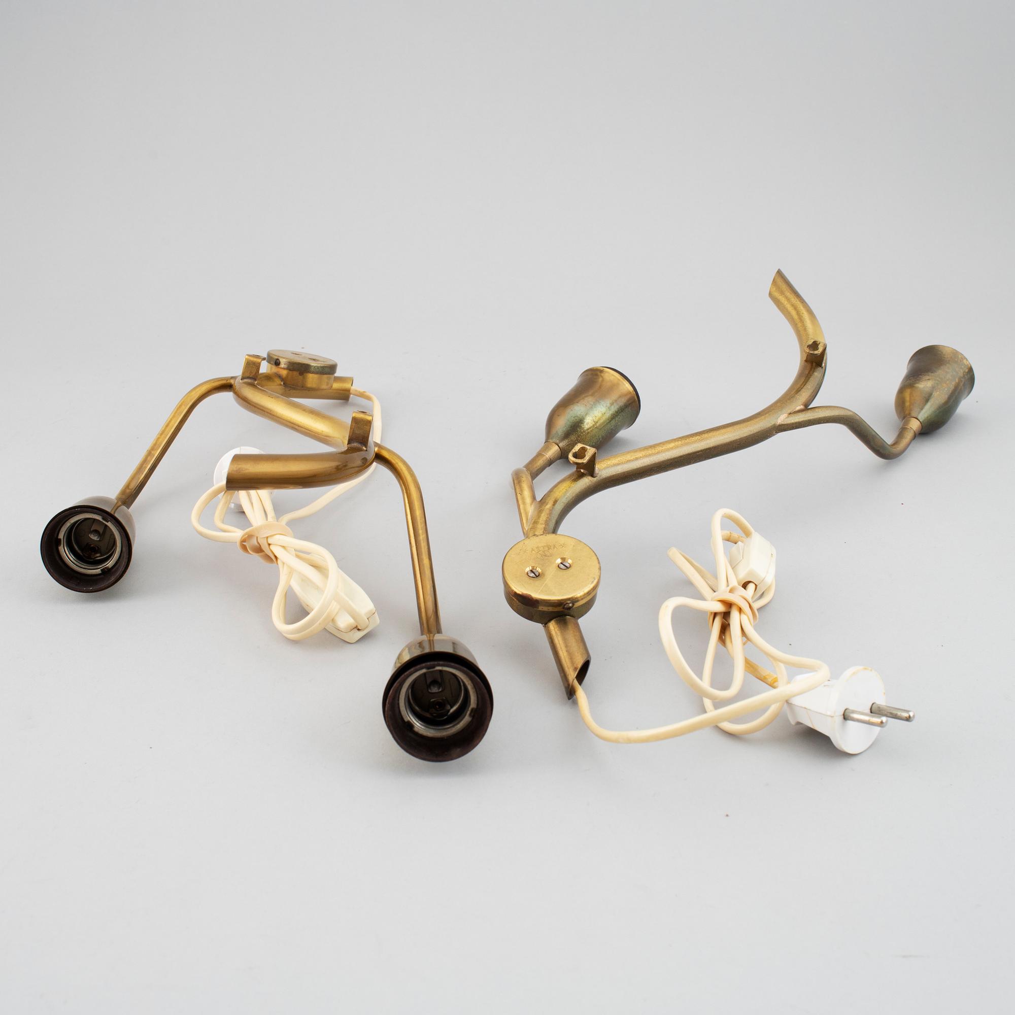 A pair of Astra brass wall lamps, mid 20th century.