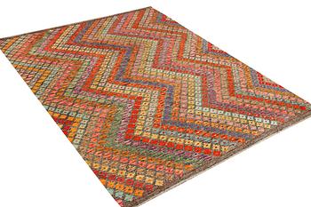 A Kilim carpet, c. 296 x 211 cm.