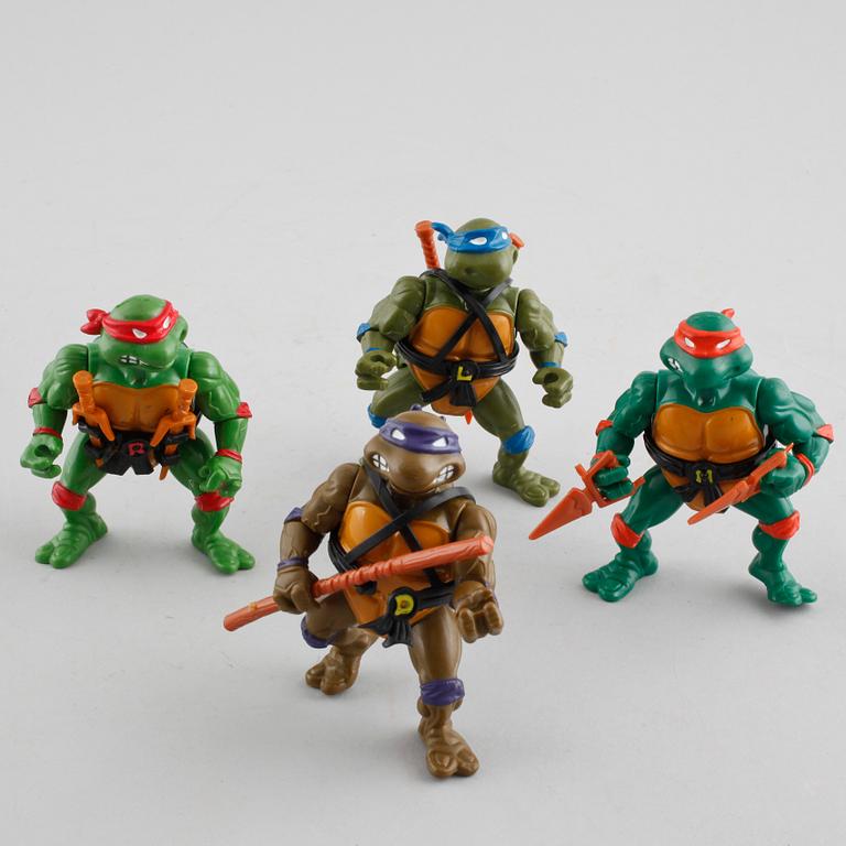 16 Teenage Mutant Ninja Turtles toys from Playmates toys, 1980s and 1990s.