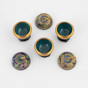Ten snuff bottles and small bowls, metal, cloisonné and lacquer, China, 20th century.