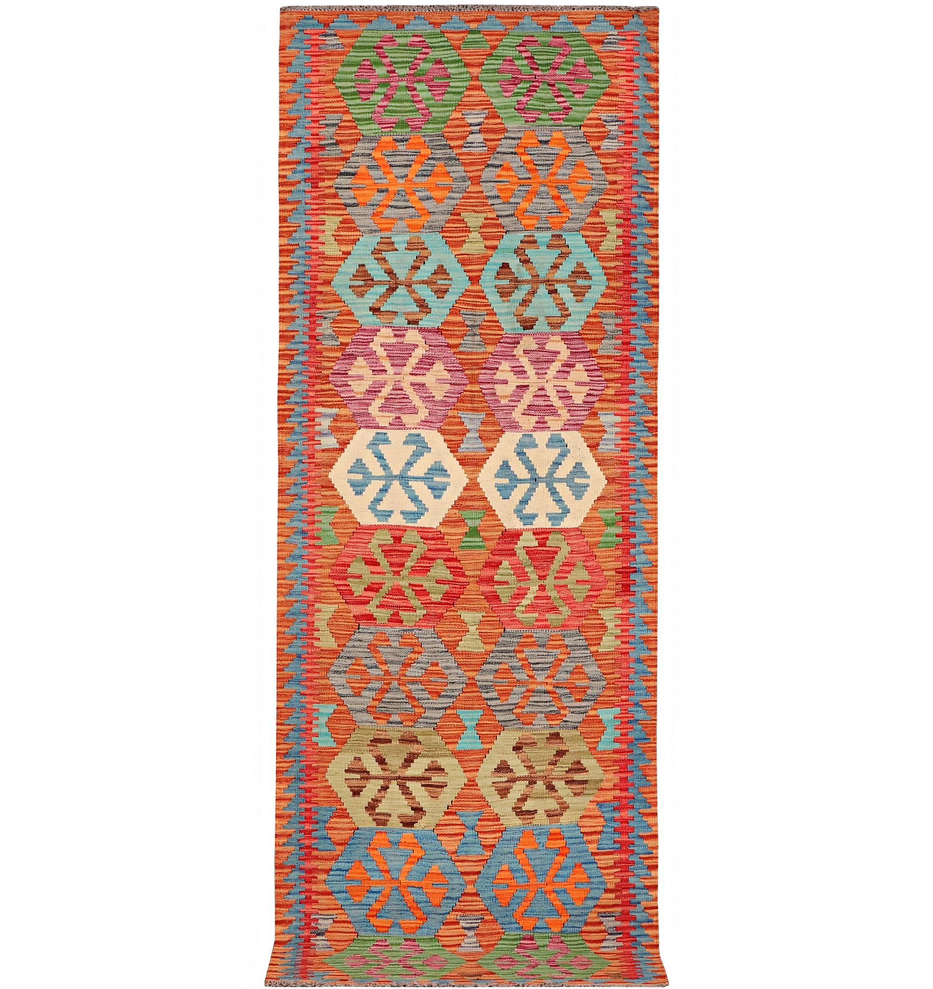 A Kilim runner, c. 298 x 84 cm.