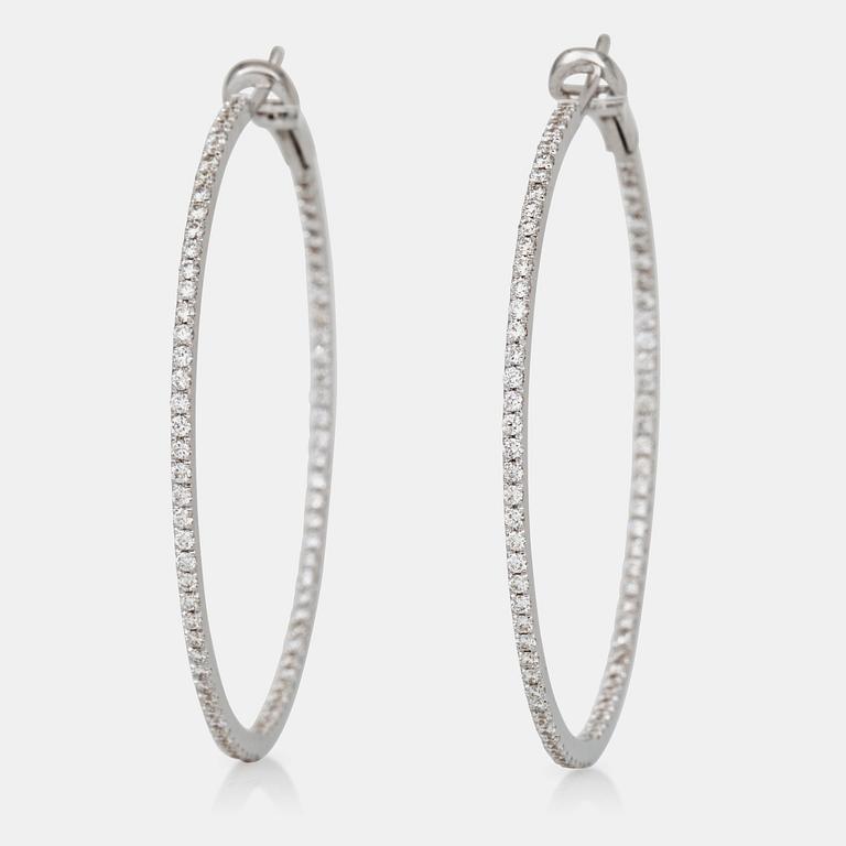 A pair of brilliant-cut diamond hoop earrings. Total carat weight circa 1.80 cts.