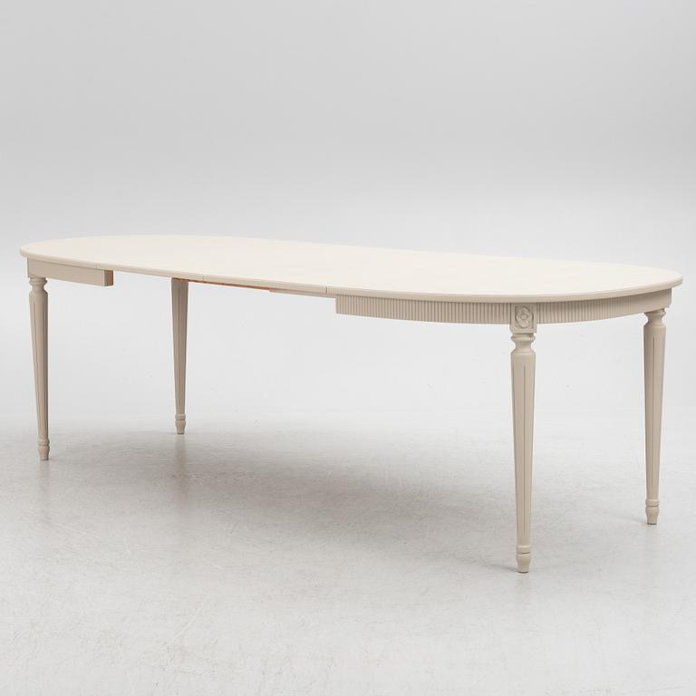 A Gustavian Style Dining Table and 10 Chairs, second half of the 20th Century.