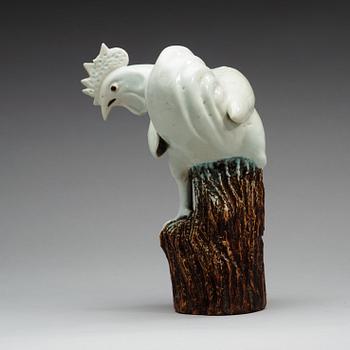 A white glazed figure of a rooster, Qing dynasty (1644-1912).