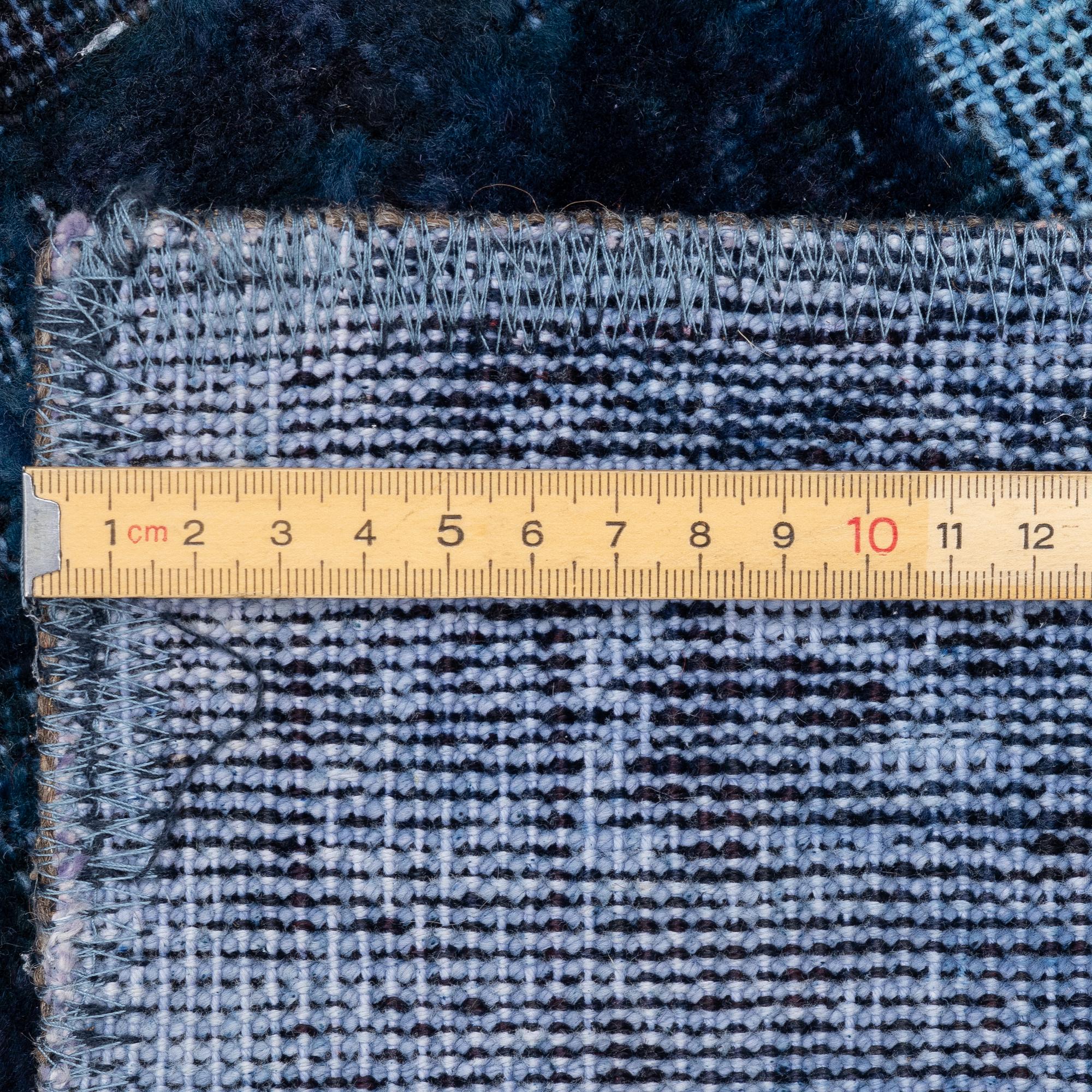 A Vintage Design carpet, approx. 306 x 229 cm, contemporary.