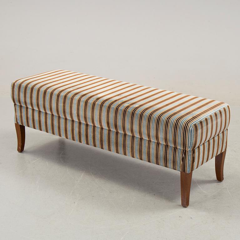 A 21st century footstool. Selva Style International Furniture, Italy.