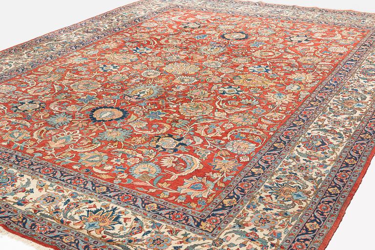 A carpet, semi-antique, Qum, ca 433 x 323 cm.