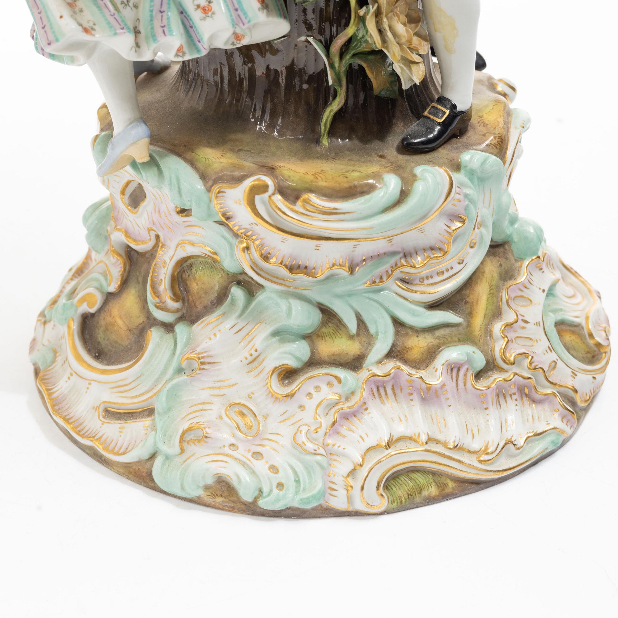 Meissen, A large polychrome reticulated porcelain basket on a pedestal with dancing figures, 19th century.