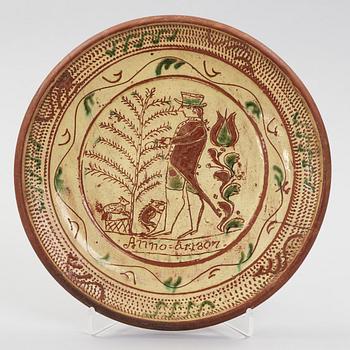 a earthenware plate dated 1807.