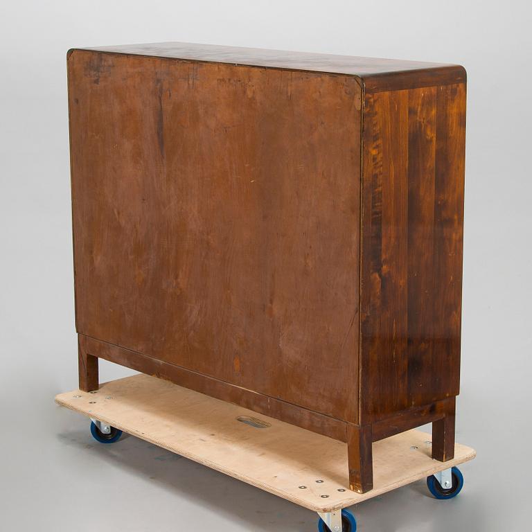 A 1930s functionalist style cabinet.