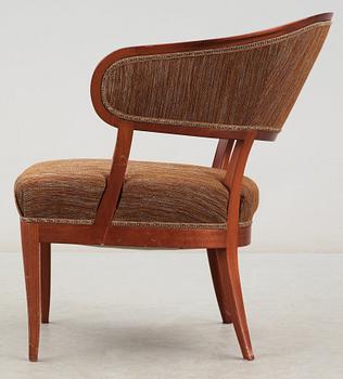 A Carl Malmsten mahogany easy chair 'Jonas Love', Sweden.