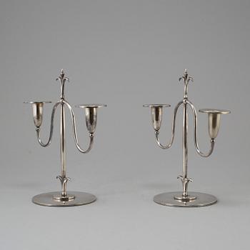 a pair of Elis Bergh silver plated candelabras, Swedish grace, CG Hallberg, Stockholm, 1920s.