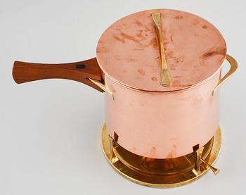 A copper pot with rechaud by Jens Quistgaard, third quarter of the 20th century.