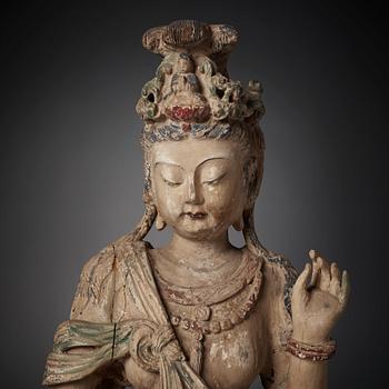 A large wooden sculpture of Guanyin, Ming dynasty (1368-1644).