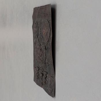 A Tibetan copper relief, 20th century.